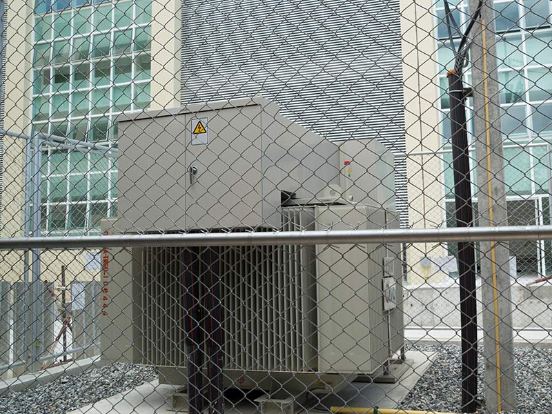 commercial generator in fence outside building georgetown tx