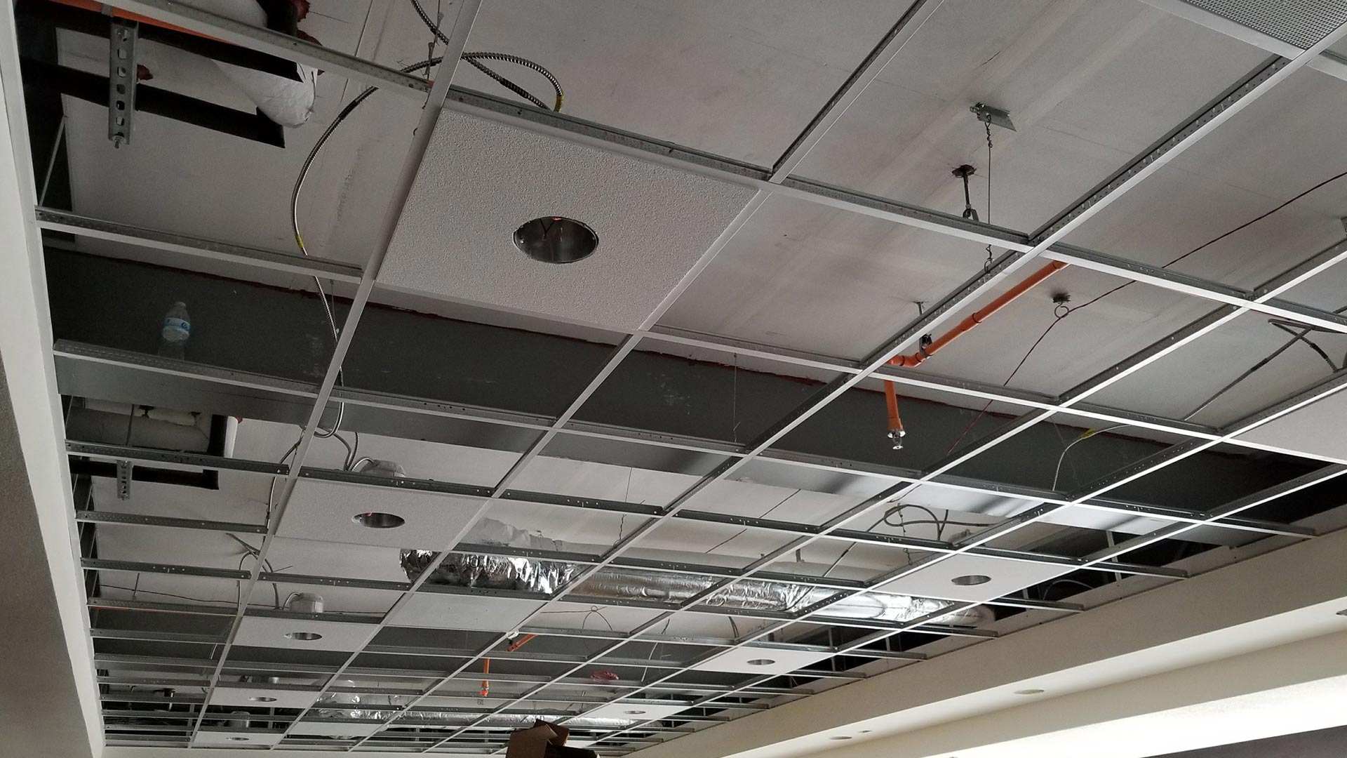 ceiling of commercial building room getting electrical installed georgetown tx